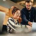 Imageoftwoworkerscollaborating